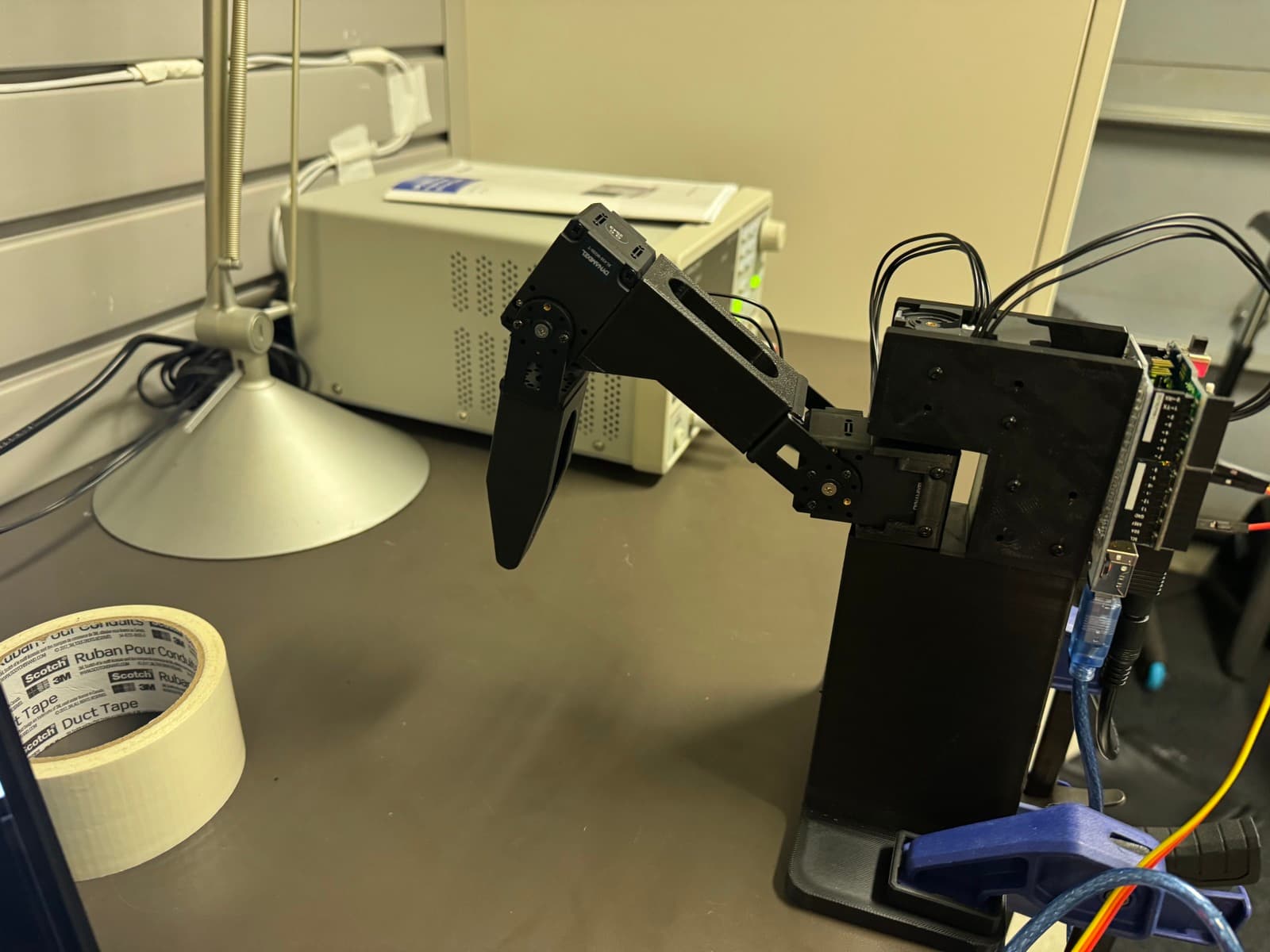 The leg wired to the bench power supply