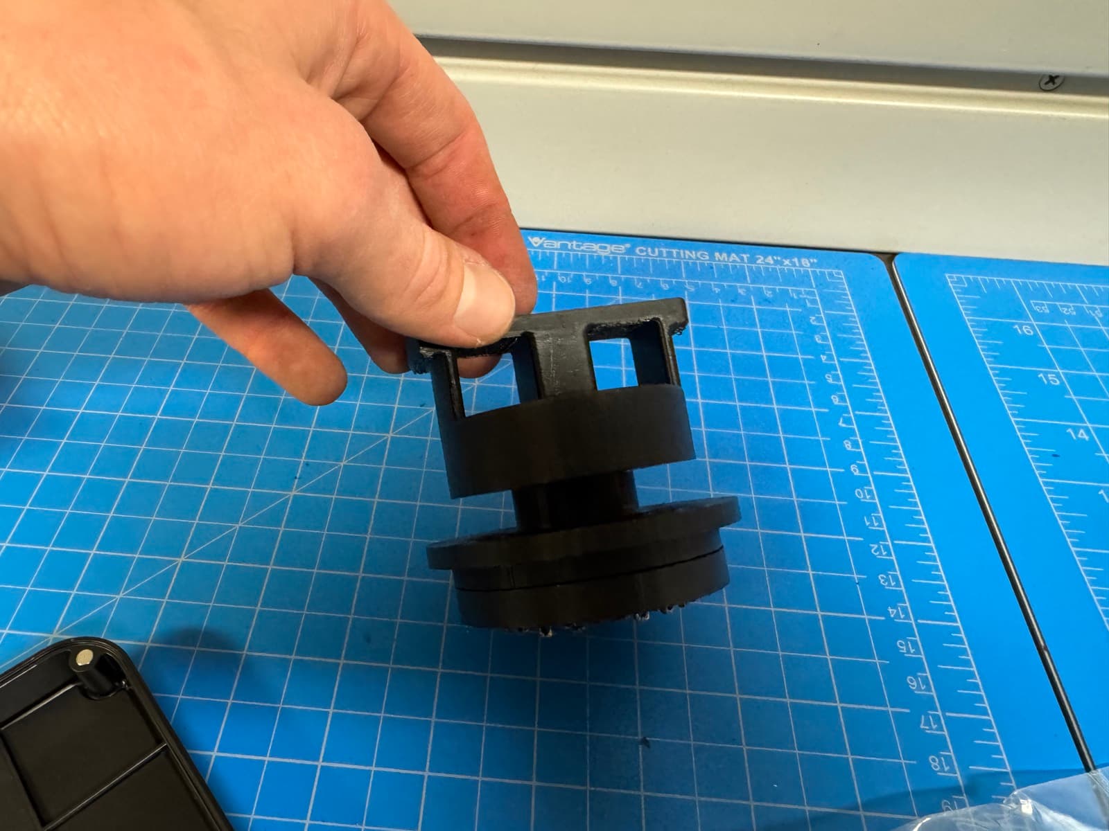 The 3D-printed gripper parts during assembly